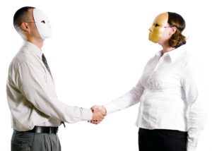 Two people wearing a mask in a professional setting