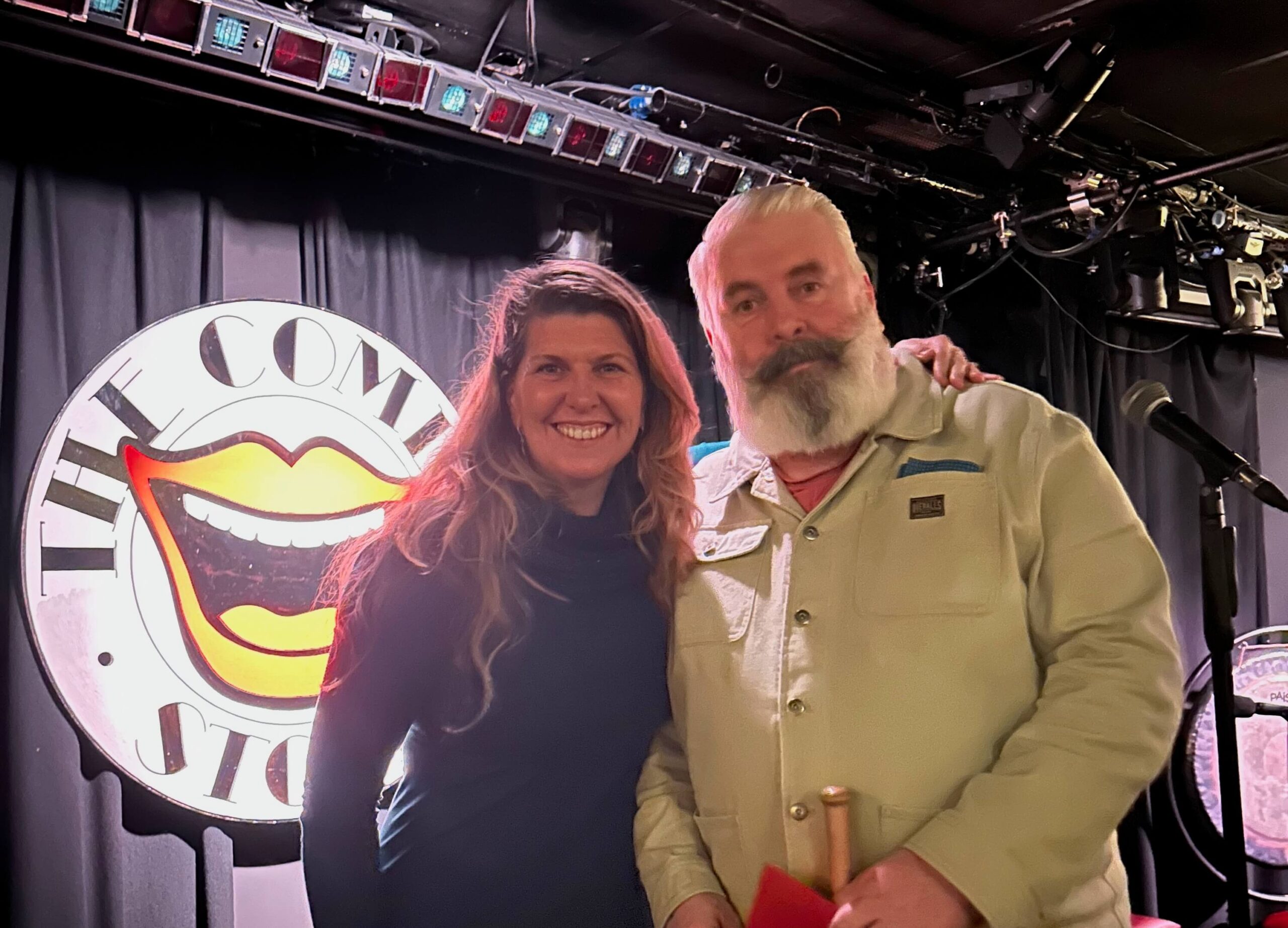 Chloe O'Sullivan, creator of War to Peace®, performing at The Comedy Store, illustrating how overcoming public speaking fear mirrors workplace conflict resolution